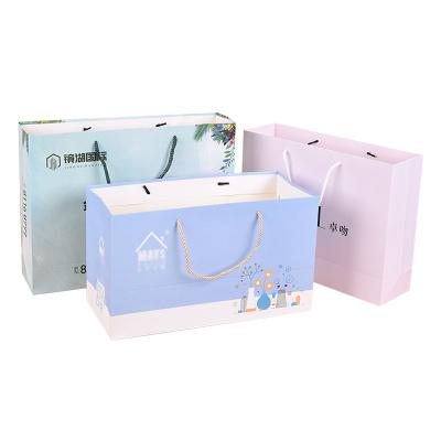 China High Quality Recyclable Gift Packaging Luxury Flat Bottom Cardboard Paper Gift Bag Packaging For Clothes Shopping With Ribbon Handles for sale