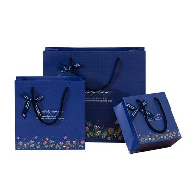 China China Manufacturer Recyclable Custom Luxury Printed Gift Shopping Paper Bag With Your Own Logo And Bowknot for sale