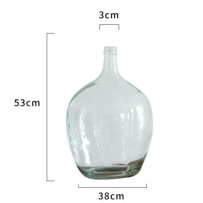 China DaveQimoo Modern Wholesale European Creative Clear Bottle Dining Home Decor Flower Wedding Table Top Glass Vase for sale