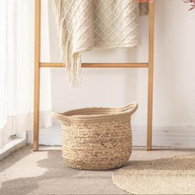 China Minimalist Hot Sale Woven Storage Basket With Handles Decorative Floor Wicker Basket Boho Basket For Toy Shoe Firewood Farmhouse Covering for sale