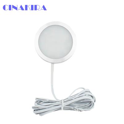 China Strong Adhesive Cabinet Puck Light Decoration LED Puck Light, High Brightness DC Operated Round LED Spot Puck Furniture /Cabinet/Closet Light for sale