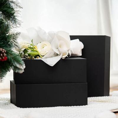 China Recycled Materials Guangdong Christmas Photo Chocolate Bakery Low Price Xmas Wedding Favors Guest Trinket Magnetic Gift Box With Ribbon For Girls for sale