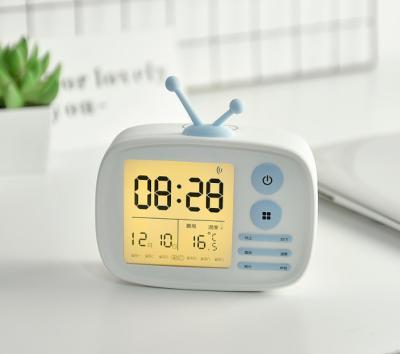 China TV Shaped Kids Alarm Clock Multifunctional 316g ABS Silicone Glass Material for sale