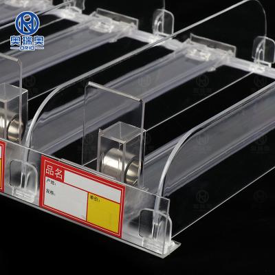 China Supermaerket Display Bury System Plastic Plastic Supermarket Pusher Shelf Divider Shelf Pusher Cigarette Pusher for sale