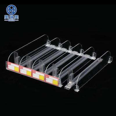 China Supermaerket Show Plastic Fridge Shelf Dividers Supermarket Shelf Lifter Cigarette Lifter for sale