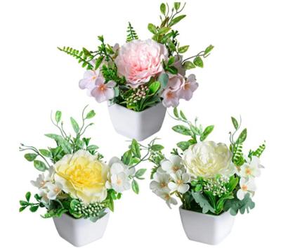 China Mini Artificial Potted Flower Candida Camellia Plant White Plastic Pot Environment Friendly Artificial Plant for sale