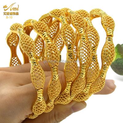 China 2021 Chunky Metal Man 18K Gold Romantic Custom Bangles Bracelets For Women Girl Fashionable Personal African Initial Hand Bangle for sale