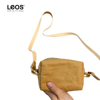 China Easy Carry Lightweight Kraft Paper Messenger Bag For Ladies And Girls for sale