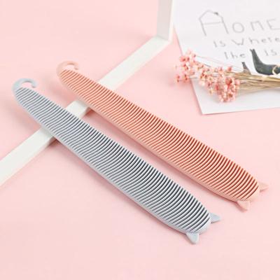 China Viable Pet Cat Tongue Texture Design Massage Comb To Clean And Remove Floating Cat Fur Cat Supplies Portable Multi-Purpose Comb for sale