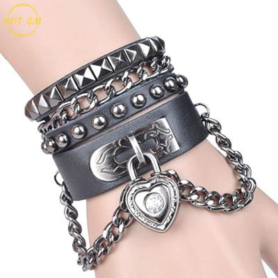 China Decoration Bracelet Multilayer Black Leather Bracelet For Men Women Bracelet With Heart Tassel Spike Studded Rivet Chain Pendant Bracelet for sale