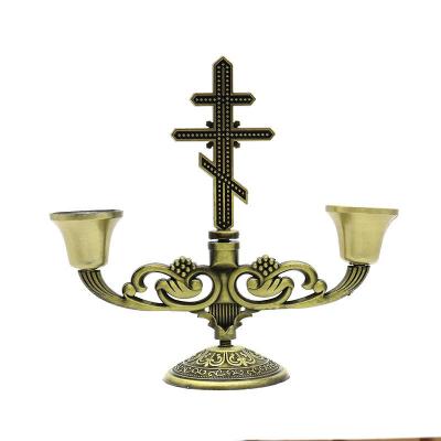 China Religious Activities Spot Goods Russian Orthodox Church House of Worship Decoration Ornaments Antique Zinc Alloy Cross Metal Symmetric Candlestick for sale