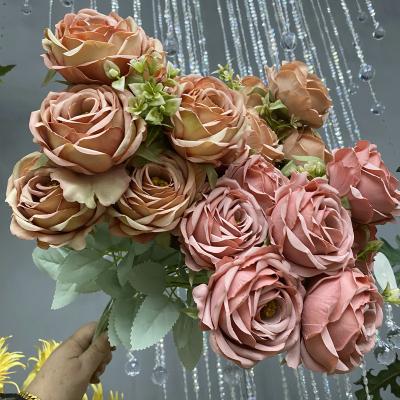 China 9 Head Silk Coated Gold Rose Wedding Props Flower Wall Decoration Living Room Decoration Road Lead Flower Arrangement Simulation Rose for sale