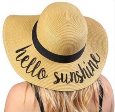 China Black Eco-friendly Ribbon Straw Hat Women Print Letter Sun Straw Paper Material Hello Decorative Beach Straw Hat for sale