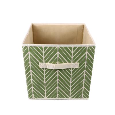 China Foldable Multifunctional Non Woven Textiles And Cardboard Storage Foldable Basket Daily Necessities Storage Box for sale