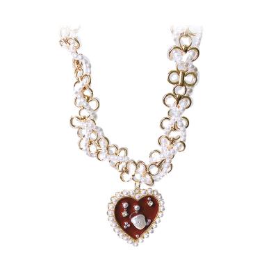 China Romantic Fashion Elegant Red Lovers Necklace Collection Pearl And Alloy Necklace for sale