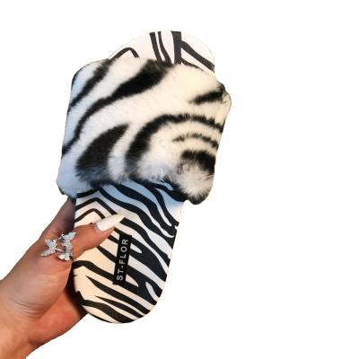 China Fashion trend 2021 summer fashion flat bottom ladies plush sandals black and white female external use animal leopard stripes slippers for sale