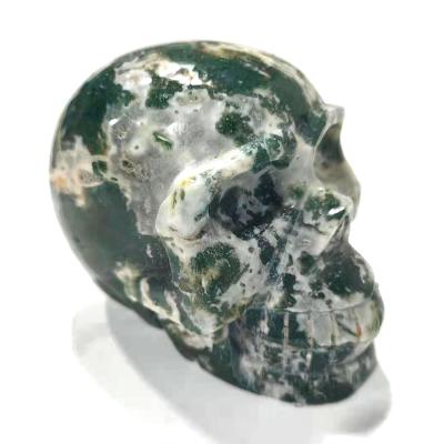 China China Wholesale Crystal Skulls Moss Agate Natural Stone Processing Moss Agate Skulls For Gifts for sale