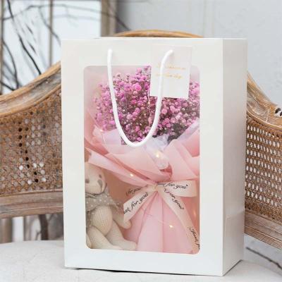 China Recyclable Custom Logo Gift Packaging Bags Flower Gift Bag With Window Rigid Paper Bag for sale