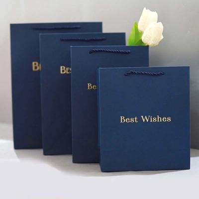 China Recyclable Custom Logo Gift Bag Biodegradable Packaging Bags Shopping Paper Bag for sale