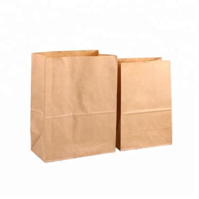 China Recyclable High Quality Brown Die Cut Kraft Paper Shopping Bag for sale