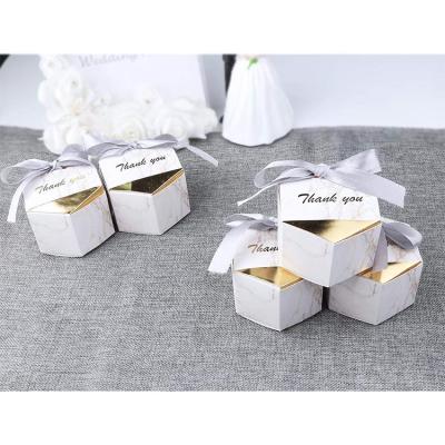 China Handmade High Quality Decorative Wedding Favor Hexagon Candy Silver Marble Paper Box With Ribbon for sale