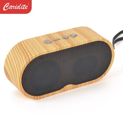 China EZCast Caridite TWS Wireless Mini Wooden Speaker For All Smart Phone Laptop Subwoofer Box Manufacturer Wholesale for sale