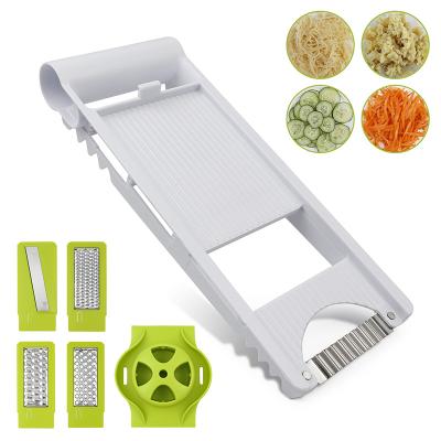 China Hot Sales Viable 5 in 1 Hand Kitchen Fruit Onion Slicer Cutter Plastic Vegetable Cleaver for sale