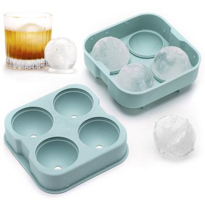 China Wholesale Portable Ice Ball Mold 4 Cavity Round Ice Cube Stored Tray With Lid Ice Ball Maker Mold for sale