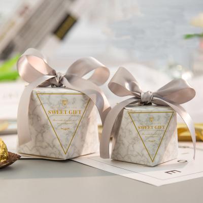 China New Europe Hexagon Style Recyclable Candy Box Wedding Favors Paper Gift Boxes With Ribbon for sale