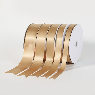 China Sustainable Luxury Gold Color Polyester Printed Logo Ribbon For Packing Decoration for sale