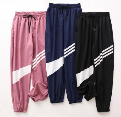 China Anti-wrinkle 2022 spring and summer sports sweatpants quick-drying pants lightweight and breathable casual loose harem pants gaiters for sale