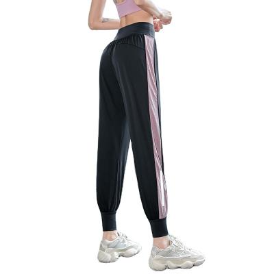 China Anti-static loose sports pants women and fitness leggings fashion waist color matching yoga pants running thin autumn high pants for sale