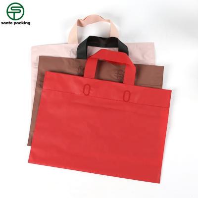 China Recyclable Customized Logo Clothing Store Bag Biodegradable Plastic Drawstring Shopping Bag for sale