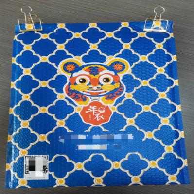 China Christmas Tiger Christmas Tiger Mailing Envelope Strong Adhesive Blue Waterproof Recyclable Compound Matte Film Bubble Bag for sale