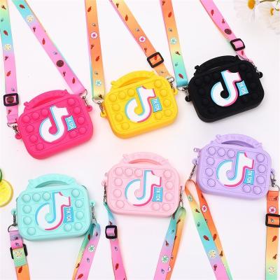 China New style high quality tending bubblle tiktok tiktok tiktok purse tok purse handbags anti effort push compression children girl toddler girl with led light for sale