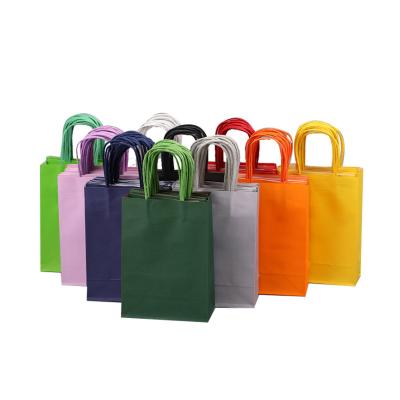 China Colorful Logo Printing Kraft Paper Bag Clothing Packaging Handbag Gift Bag Recyclable Custom Candy Shopping Bag for sale