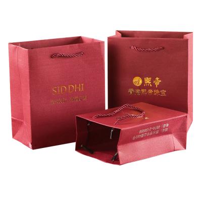 China Special Silver Recycled LOGO Handbag Wholesale Custom Made Materials Gift Paper Bag Jewelry Red Wine Bag Iron Bag for sale