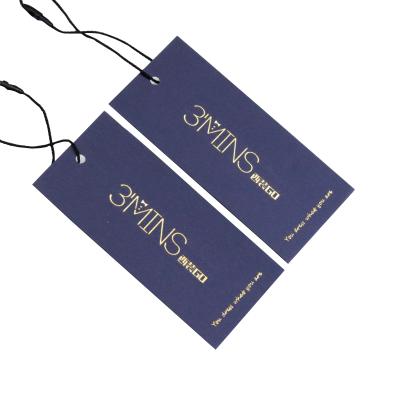 China Sustainable Custom Luxury Hanging Tag Free Swing Special Paper Tags Product Hang Tags Clothing Garment for sale