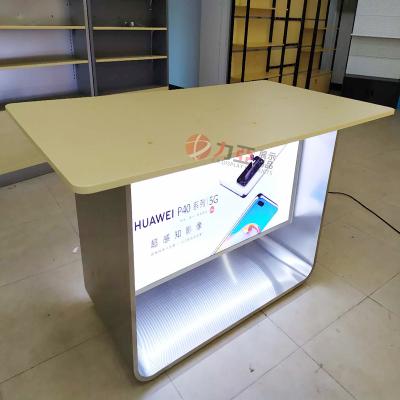 China Factory Design Durable Cell Phone Shop Laptop Table Led Lighting Wooden Logo Display Tables for sale