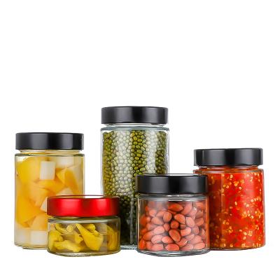 China Wholesale Food Glassware Kitchen Accessories Pantry Storage Bottles And Jars Sets With Metal Lid for sale