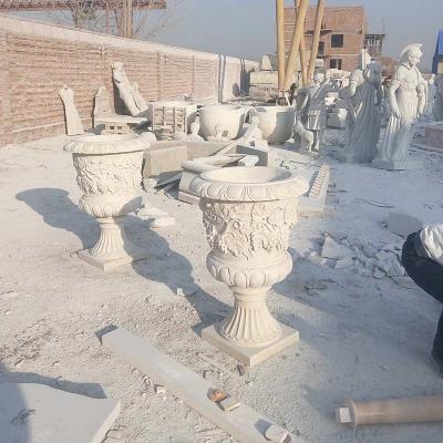 China Outdoor Garden Decorative Marble Urn Planters Customized Size White Stone Flower Pots for sale