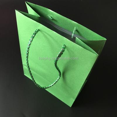 China Recyclable cheap custom glossy paper shopping bag with custom logo for bikini for sale