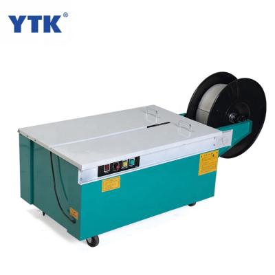 China Fully Automatic CLOTHING Carton Box Case PP Plastic Belt Sealing And Strapping Strapping Packing Machine for sale