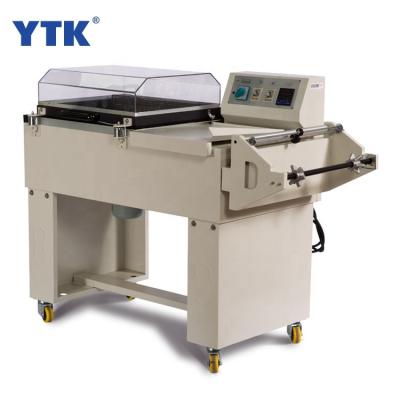 China Small Heat Simple Operation Easy Maintenance Manual PE Film Shrink Packaging Machine Foods Flavor Box Bottle Packing Machine for sale