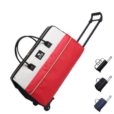 China The simple atmosphere the new color ywheel troll waterproof boarding spelling bag men and women portable travel luggage trolley bag for sale