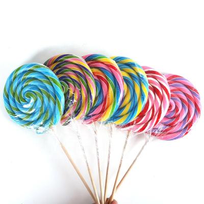 China Big size 250g natural swirl gift pack halal rainbow fruit giant handmade multi fruit lollipop candy for sale