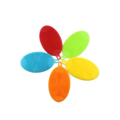 China Sustainable Kitchen Cleaning Brush Flexible Oval Silicone Scrubber for sale