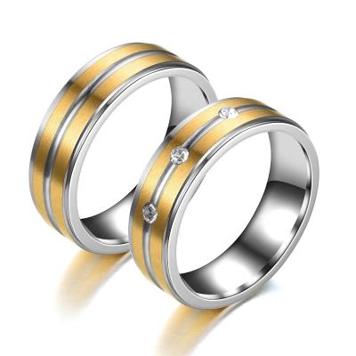 China Fashion Comfort Fit Gold Couple Rings Gold Plated Frosted Titanium Steel Diamond Ring Men And Women Stainless Steel Jewelry for sale