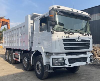 China Gebruikte SHACMAN F3000 8X4 6X4 zware dump truck 12 banden 400HP dumper Te koop