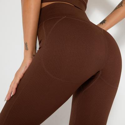 China Breathable Gym European and American High Waist Solid Color Hip Peach Pop Style Sports Pants Fitness Tight Pants for sale